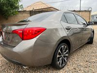 4 plug Forigen Used Toyota Corolla SE.